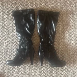 Knee-high black leather boots